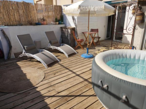 Chambre cabane de charme, terrasse et spa privé